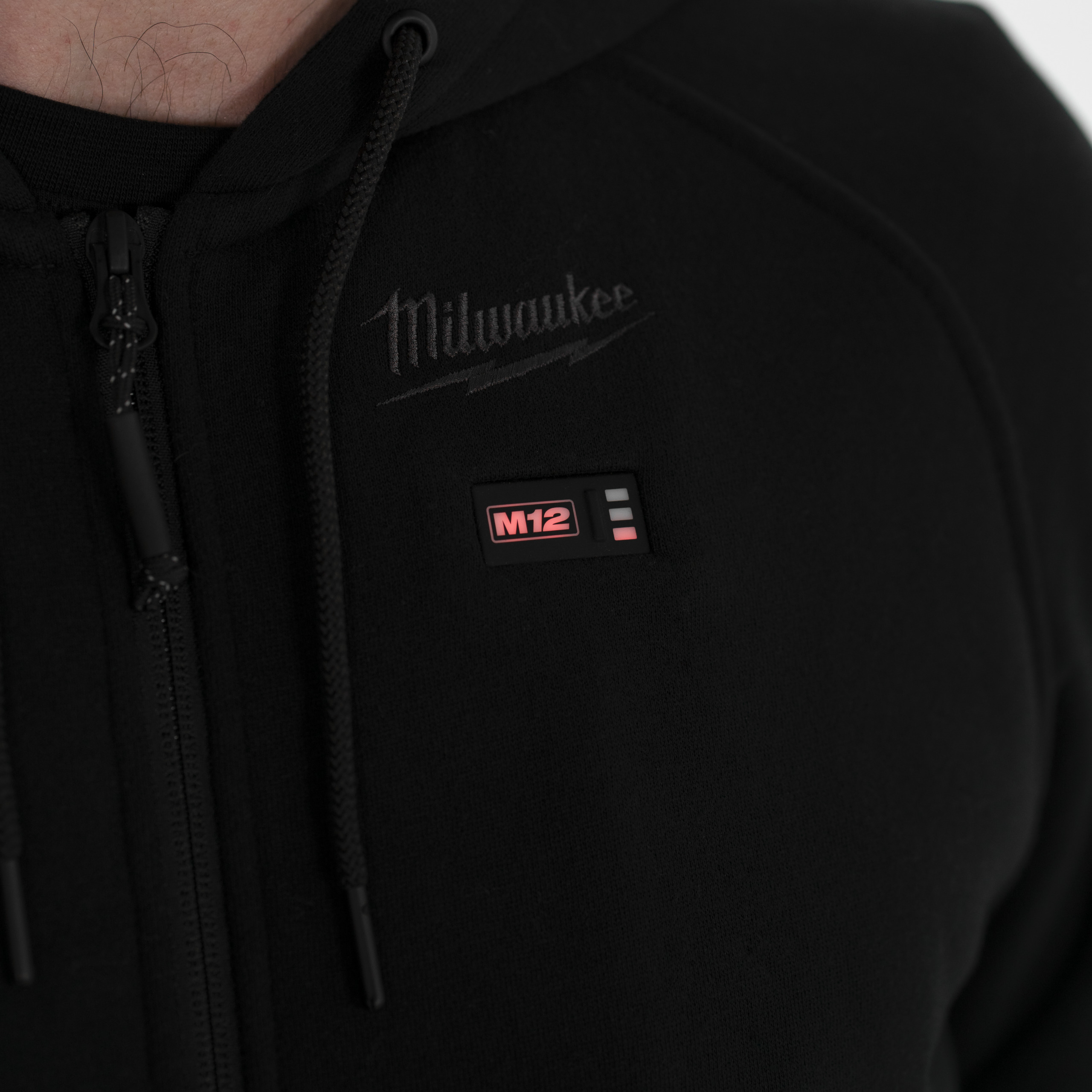 M12HHBL4-0(XL) — 12 V Akku-Heiz-Kapuzenpullover Herren schwarz, ohne Akku u. Ladegerät – Bild 5